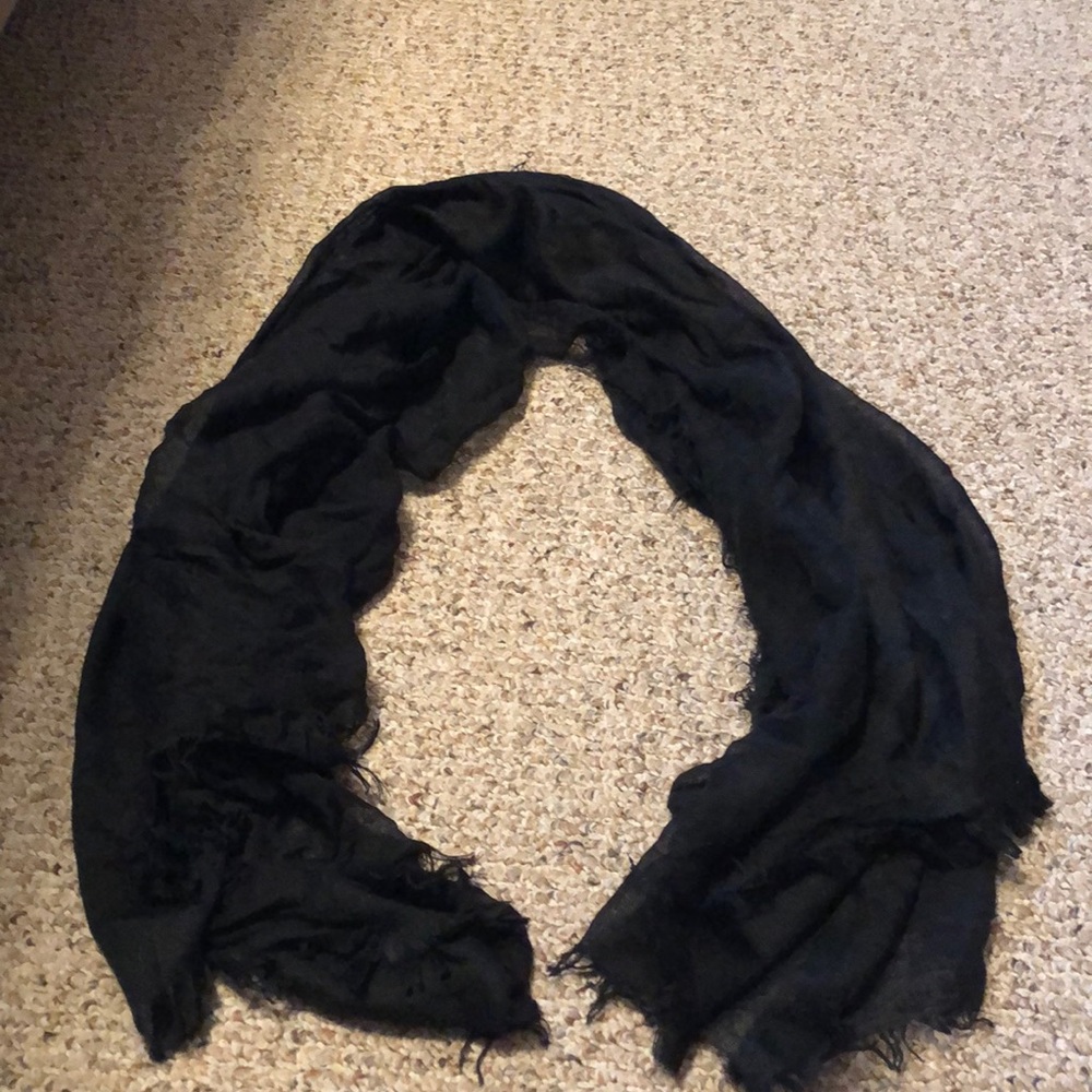 Scarf with ruffling on it.